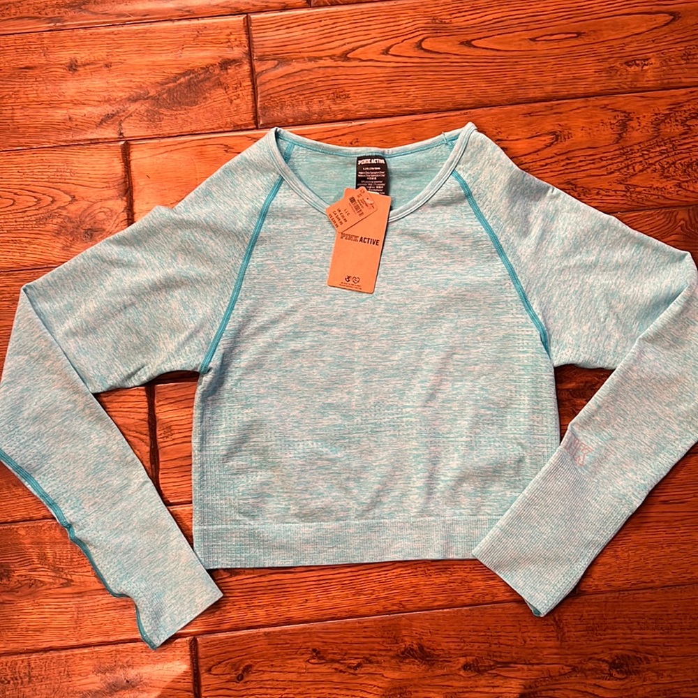 Turquoise blue crop workout long sleeve top. Brand new from PINK. Size large